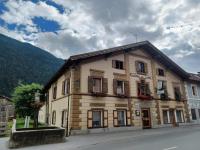 a large building on the side of a street at Hotel Garni Löwen in Silz