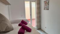 Posteľ alebo postele v izbe v ubytovaní Apartamentos Séneca junto al Centro