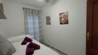 Posteľ alebo postele v izbe v ubytovaní Apartamentos Séneca junto al Centro