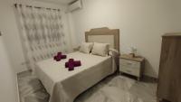 Posteľ alebo postele v izbe v ubytovaní Apartamentos Séneca junto al Centro