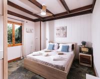 Posteľ alebo postele v izbe v ubytovaní Wooden Beach House