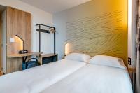 Posteľ alebo postele v izbe v ubytovaní B&B HOTEL Landerneau Bois Noir