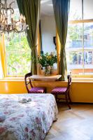 Postel nebo postele na pokoji v ubytování Boutique Hotel Museumkwartier