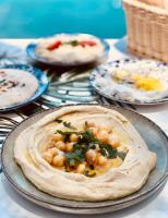 a group of plates of food on a table at Blue Bay Lifestyle - ex Bali Blue Bay in Balíon