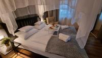Posteľ alebo postele v izbe v ubytovaní Boutique Hotel & Event Center