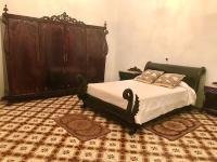 A bed or beds in a room at La Almedina: Palacio de Foronda