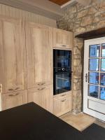 Kuchyňa alebo kuchynka v ubytovaní Maison de pêcheur e-tal ar mor