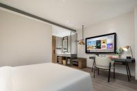 Atour Hotel Tianjin Zhongbei Haitai Industrial Parkにあるベッド