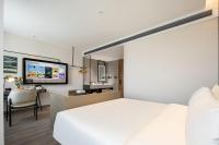 Atour Hotel Tianjin Zhongbei Haitai Industrial Parkにあるベッド