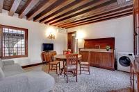 Televízia a/alebo spoločenská miestnosť v ubytovaní Grimaldi Apartments Cannaregio