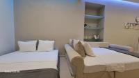 Posteľ alebo postele v izbe v ubytovaní Baulus Yard Luxury