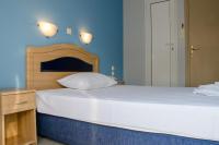 Posteľ alebo postele v izbe v ubytovaní Hôtel Argo