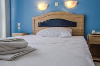 Posteľ alebo postele v izbe v ubytovaní Hôtel Argo