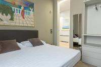 Łóżko lub łóżka w pokoju w obiekcie Deluxe apartment Milia Agrigento