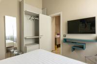 Telewizja i/lub zestaw kina domowego w obiekcie Deluxe apartment Milia Agrigento