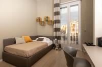Łóżko lub łóżka w pokoju w obiekcie Deluxe apartment Milia Agrigento