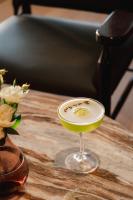 a drink in a wine glass sitting on a table at Swissotel Buyuk Efes Izmir in Izmir