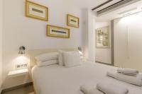 Posteľ alebo postele v izbe v ubytovaní Apartamentos Tribuna