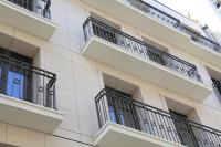 a building with balconies on the side of it at FINESTATE Coliving Champs-Elysées in Paris