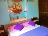 Posteľ alebo postele v izbe v ubytovaní Villa Rose Apartment