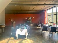 En restaurant eller et andet spisested på Apart Club San Pedro