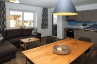 A kitchen or kitchenette at Apartment in Bramberg am Wildkogel with barbecue