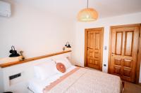 Postel nebo postele na pokoji v ubytování Kallinos Boutique Hotel