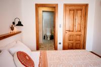 Postel nebo postele na pokoji v ubytování Kallinos Boutique Hotel