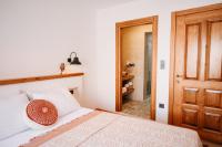 Postel nebo postele na pokoji v ubytování Kallinos Boutique Hotel