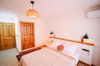 Postel nebo postele na pokoji v ubytování Kallinos Boutique Hotel