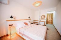 Postel nebo postele na pokoji v ubytování Kallinos Boutique Hotel