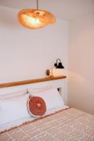 Postel nebo postele na pokoji v ubytování Kallinos Boutique Hotel
