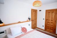 Postel nebo postele na pokoji v ubytování Kallinos Boutique Hotel