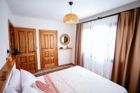 Postel nebo postele na pokoji v ubytování Kallinos Boutique Hotel