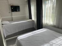 Postel nebo postele na pokoji v ubytování antik sofia hotel