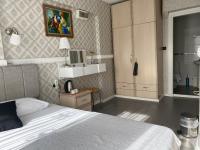 Postel nebo postele na pokoji v ubytování antik sofia hotel