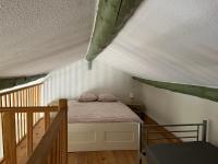 Una cama o camas en una habitaci&oacute;n de Duplex lumineux sur gde TERRASSE, BALNEO double, parking priv&eacute;