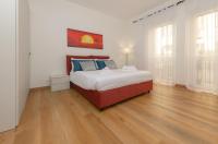 A bed or beds in a room at Royal Appartament
