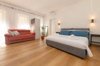 A bed or beds in a room at Royal Appartament