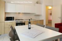 Kuchyňa alebo kuchynka v ubytovaní 3V Apartments Bardolino