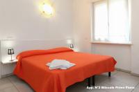 Posteľ alebo postele v izbe v ubytovaní 3V Apartments Bardolino