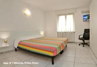 Posteľ alebo postele v izbe v ubytovaní 3V Apartments Bardolino