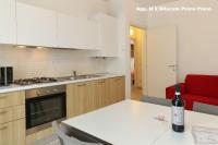 Kuchyňa alebo kuchynka v ubytovaní 3V Apartments Bardolino