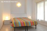Posteľ alebo postele v izbe v ubytovaní 3V Apartments Bardolino