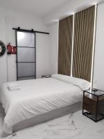 Postel nebo postele na pokoji v ubytování Malasaña Palma Studios