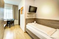Posteľ alebo postele v izbe v ubytovaní Hotel Hofmann