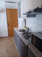 Kuchyňa alebo kuchynka v ubytovaní Apartmani MATKO