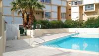 Bazén v ubytovaní Appartement avec piscine proche plage et commerces alebo v jeho blízkosti
