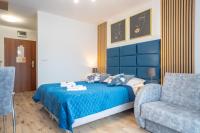 Posteľ alebo postele v izbe v ubytovaní Apartament 38 i 37 Okrzei 1c
