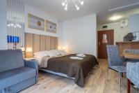 Postel nebo postele na pokoji v ubytování Apartamenty Mała Szrenica - Okrzei 1C